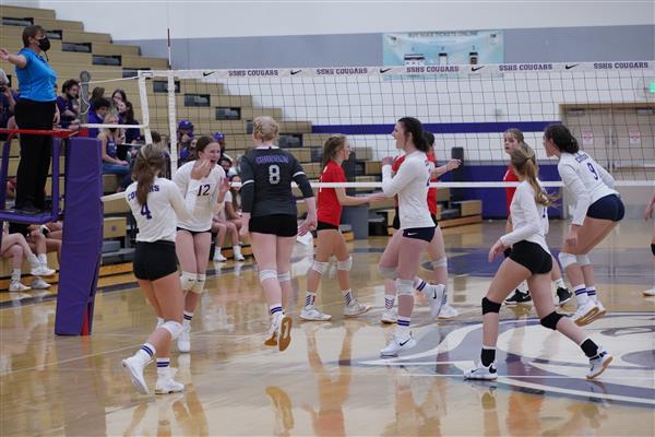 A volleyball game at Spanish Springs. They scored a point.